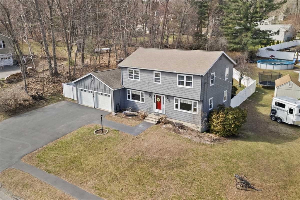 136 Winthrop Lane Holden, MA 01520 - Photo 4 of 42 front view of a house with a small yard