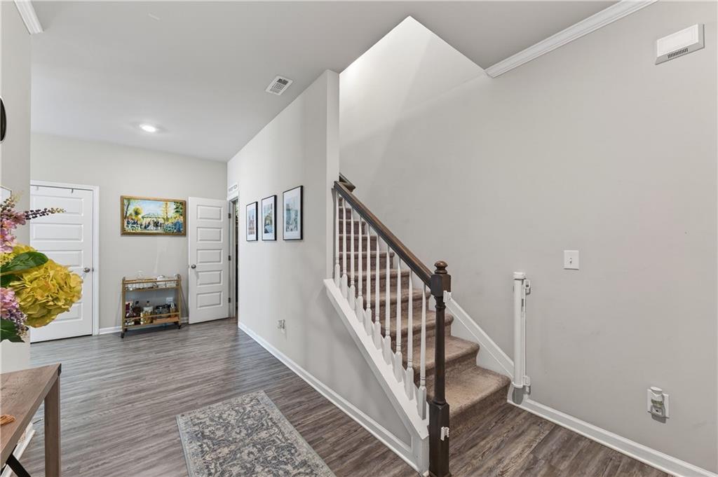 266 Shoals Bridge Road Acworth, GA 30102 - Photo 6 of 43 a view of entryway and hall with wooden floor