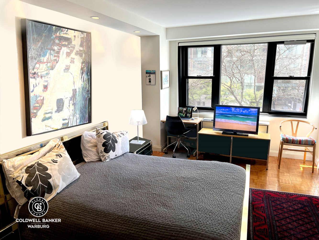 1065 Park Avenue, Unit 3B Manhattan, NY 10128 - Photo 6 of 18 a bedroom with furniture and a large window