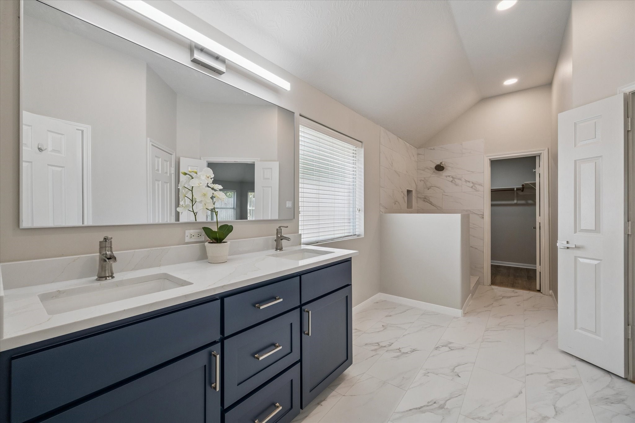 18747 Candle Park Drive Spring, TX 77388 - Photo 18 of 32 a bathroom with a sink and a mirror