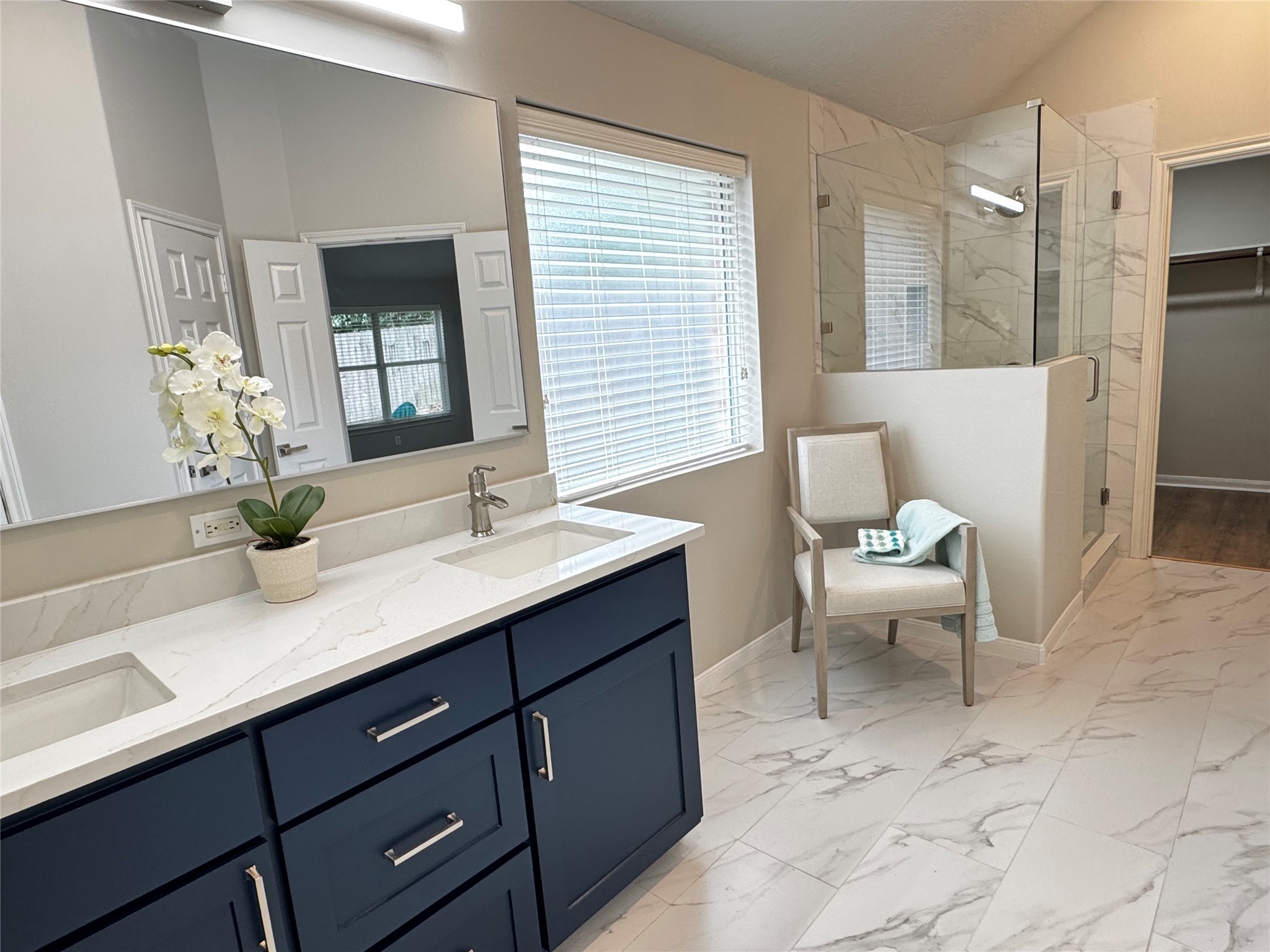 18747 Candle Park Drive Spring, TX 77388 - Photo 19 of 32 a bathroom with a sink and a mirror