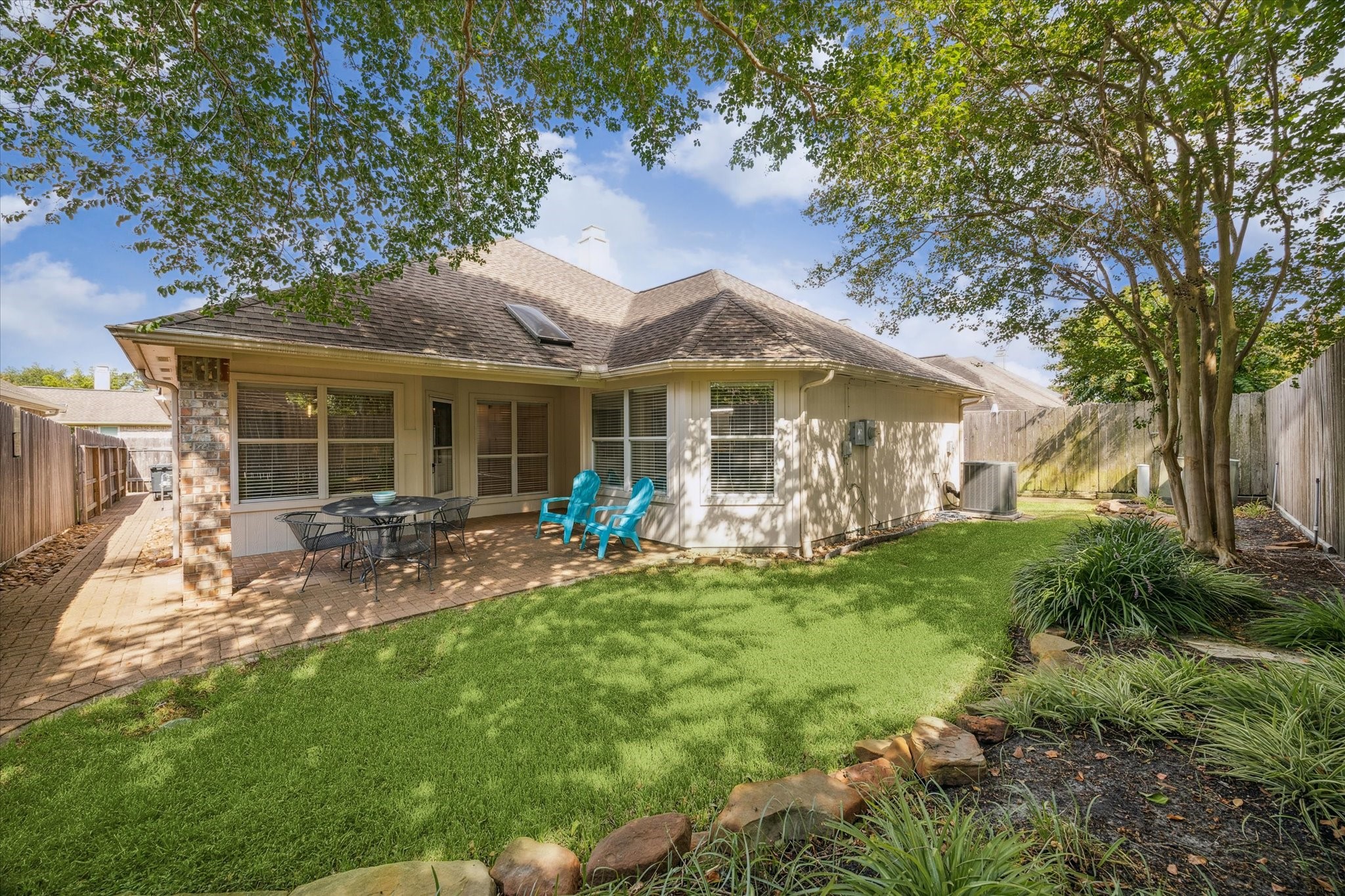 18747 Candle Park Drive Spring, TX 77388 - Photo 2 of 32 a front view of house with yard and outdoor seating