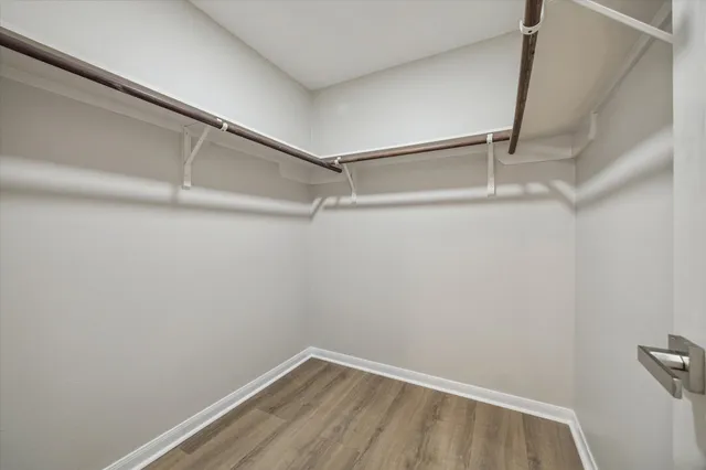 a view of an empty walk in closet