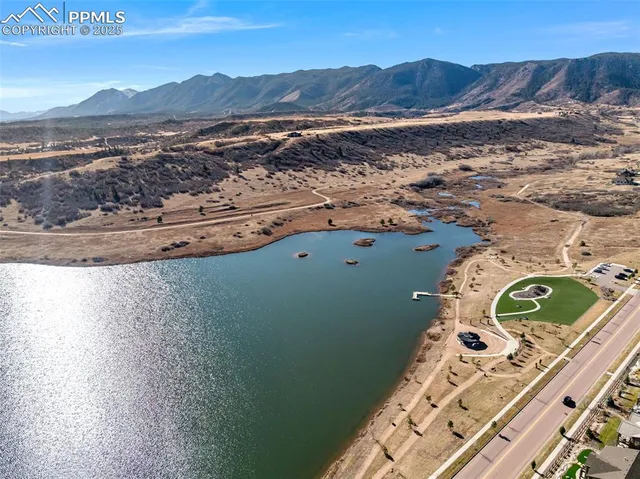 a view of a ocean with a mountain