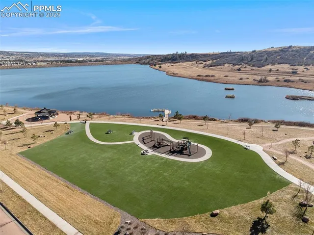 a view of a swimming pool with a terrace