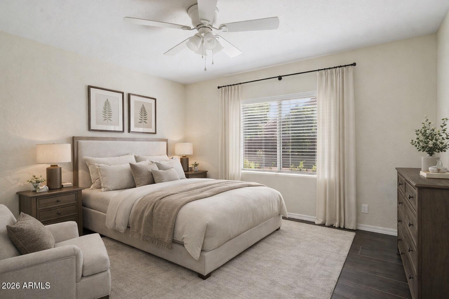 6303 West Melinda Lane Glendale, AZ 85308 - Photo 16 of 26 a bedroom with bed and window