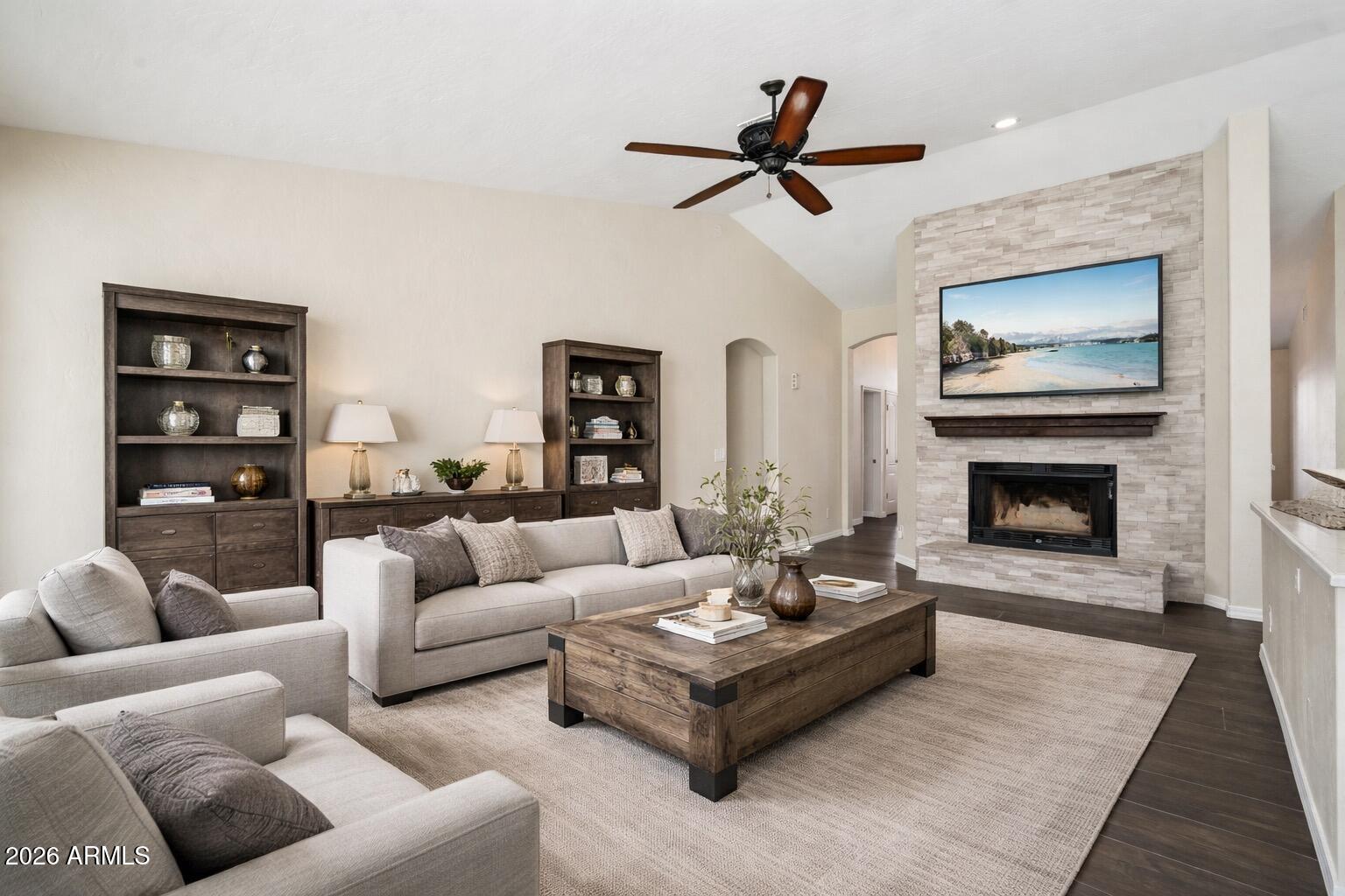 6303 West Melinda Lane Glendale, AZ 85308 - Photo 3 of 26 a living room with furniture and a fireplace