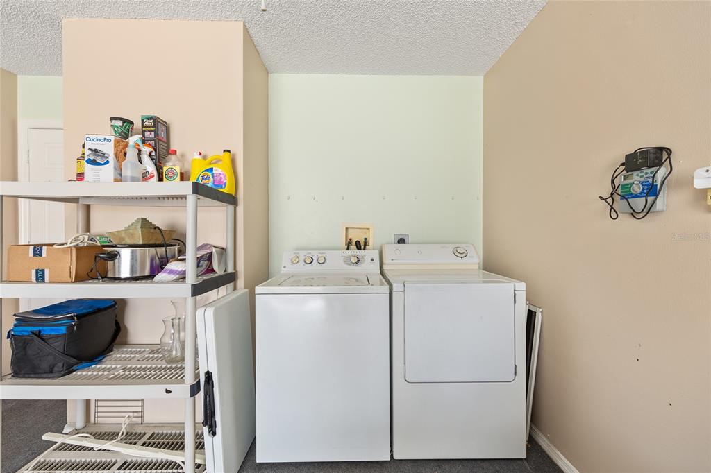 1710 Rosales Road The Villages, FL 32162 - Photo 17 of 23 a utility room with dryer and washer