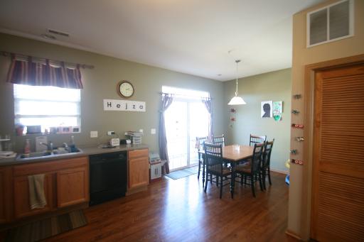 3843 Bailey Road Yorkville, IL 60560 - Photo 3 of 10 a view of a dining room with furniture and window