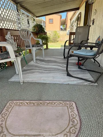 a view of a living room with furniture