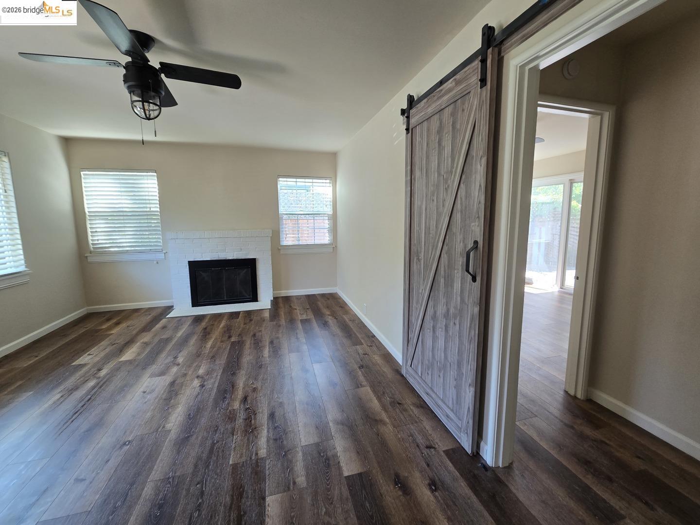 241 Humboldt Street San Rafael, CA 94901 - Photo 19 of 32 a view of empty room with wooden floor and fan