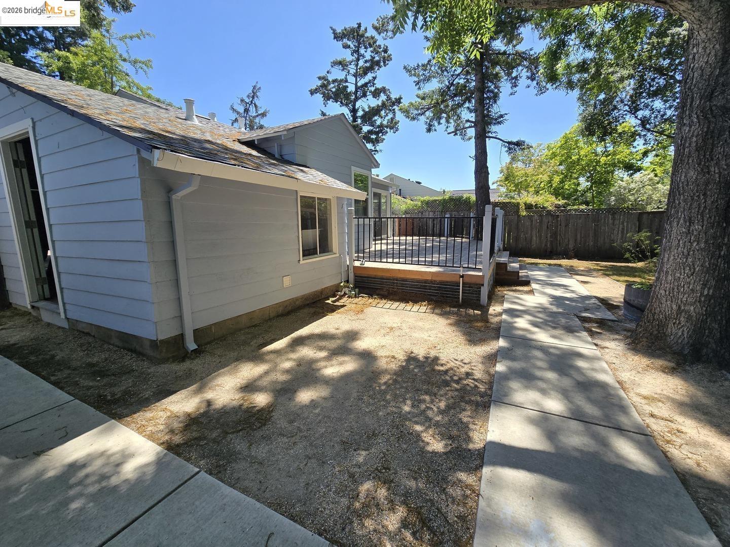 241 Humboldt Street San Rafael, CA 94901 - Photo 26 of 32 a backyard of a house with a tree