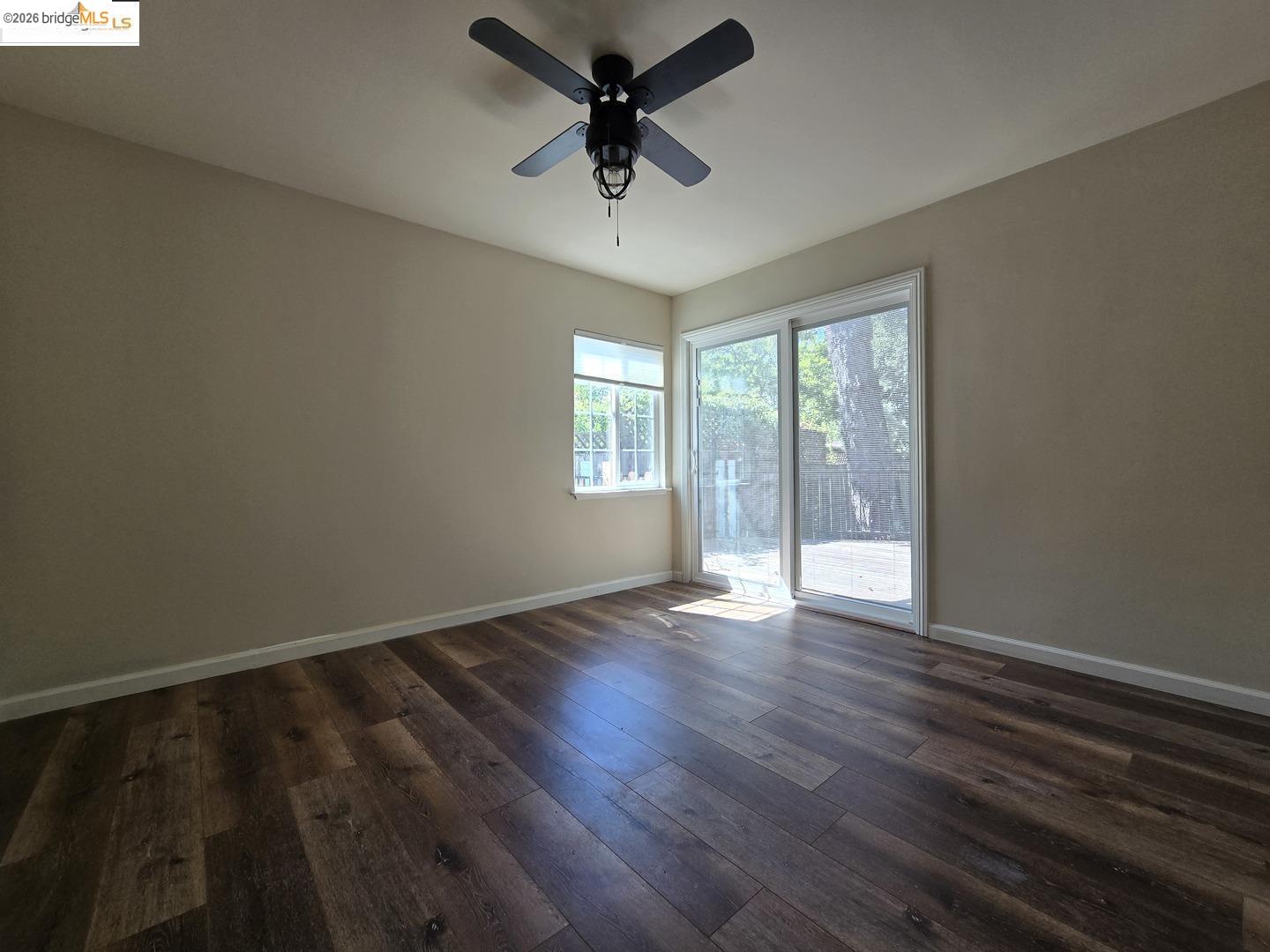 241 Humboldt Street San Rafael, CA 94901 - Photo 7 of 32 wooden floor in an empty room with a window