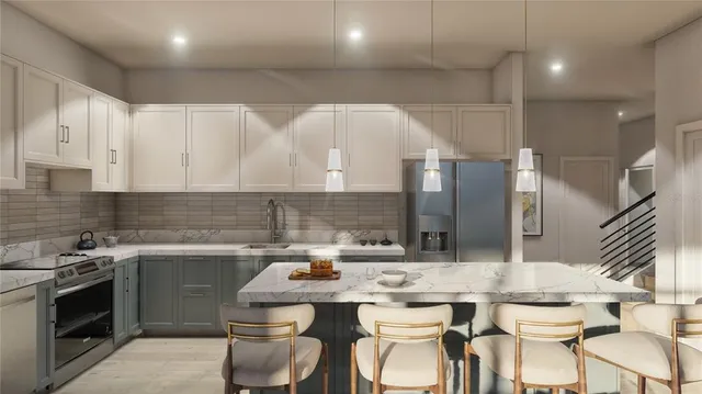 a kitchen with a sink and cabinets