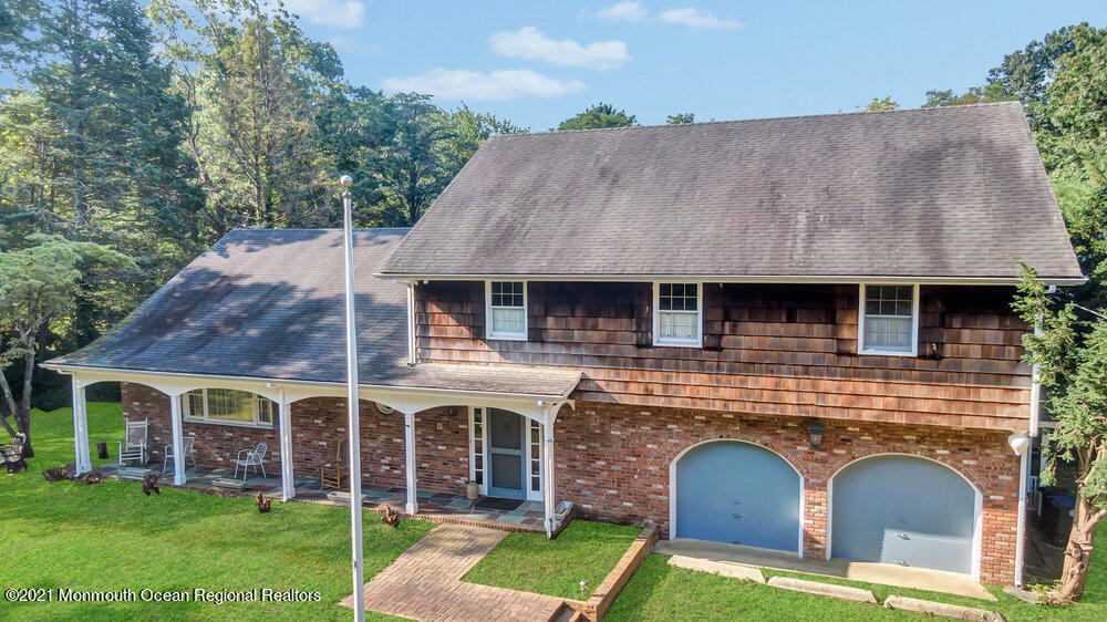 3234 Ridgewood Road Allenwood, NJ 08720 - Photo 1 of 49 a view of a house with a yard