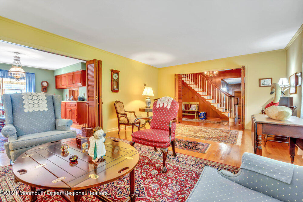 3234 Ridgewood Road Allenwood, NJ 08720 - Photo 18 of 49 a living room with furniture and wooden floor