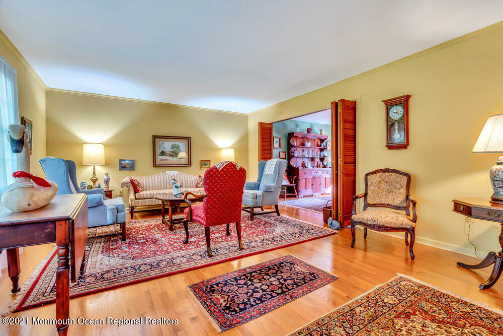 3234 Ridgewood Road Allenwood, NJ 08720 - Photo 19 of 49 a living room with furniture and rug