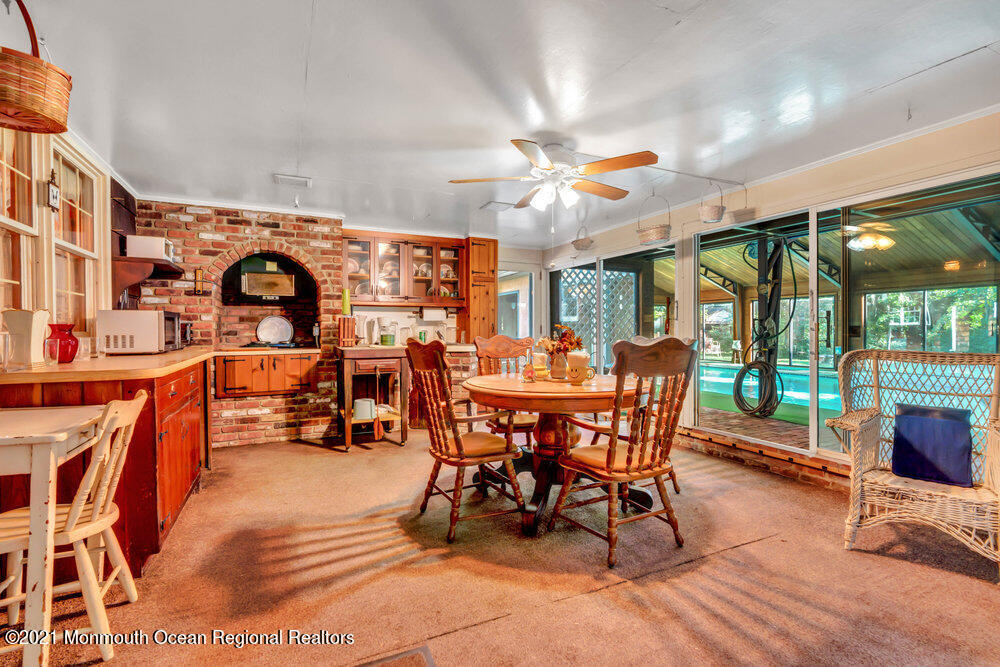 3234 Ridgewood Road Allenwood, NJ 08720 - Photo 20 of 49 a view of a dining room with furniture window and outside view