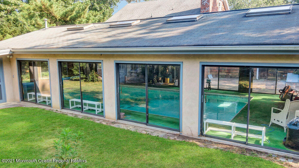 3234 Ridgewood Road Allenwood, NJ 08720 - Photo 27 of 49 a view of house with backyard outdoor seating and garden