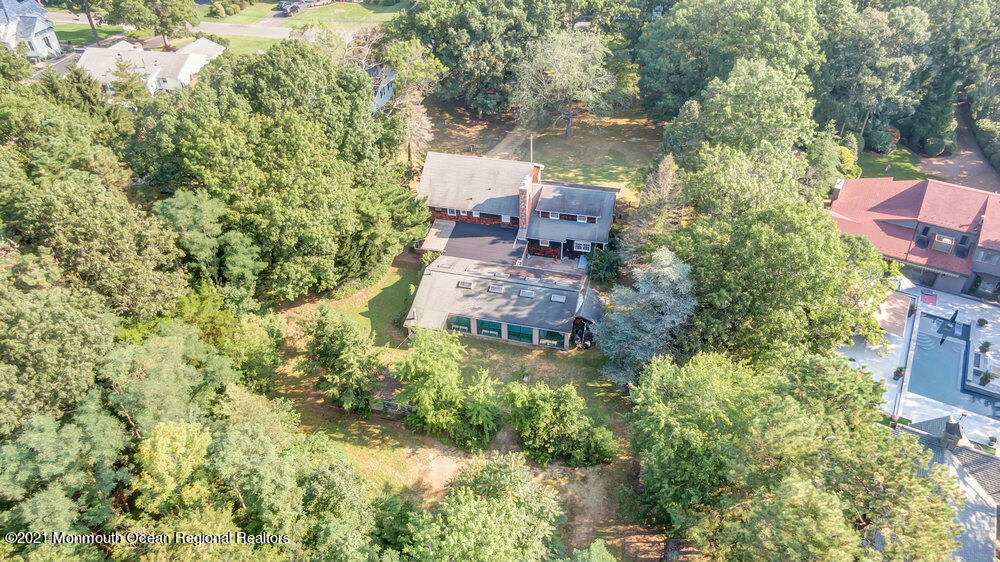 3234 Ridgewood Road Allenwood, NJ 08720 - Photo 4 of 49 an aerial view of residential house with outdoor space