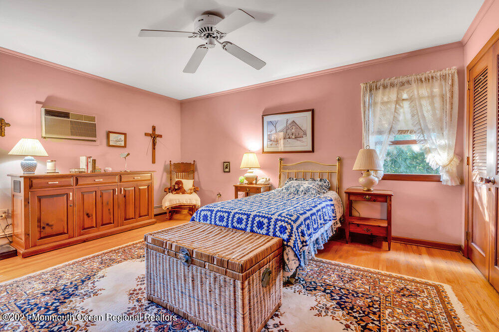 3234 Ridgewood Road Allenwood, NJ 08720 - Photo 32 of 49 a bedroom with furniture and a window
