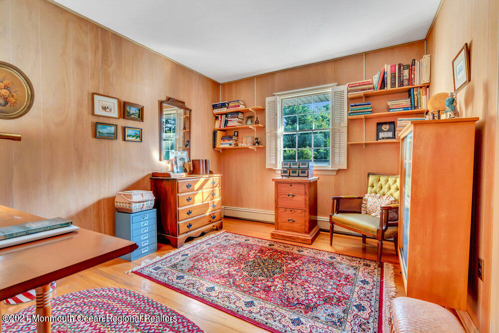 3234 Ridgewood Road Allenwood, NJ 08720 - Photo 36 of 49 a bedroom with furniture and a rug
