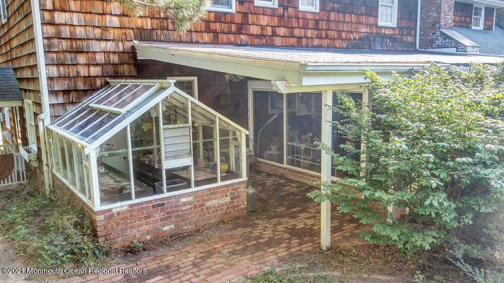 3234 Ridgewood Road Allenwood, NJ 08720 - Photo 43 of 49 a front view of a house with a yard