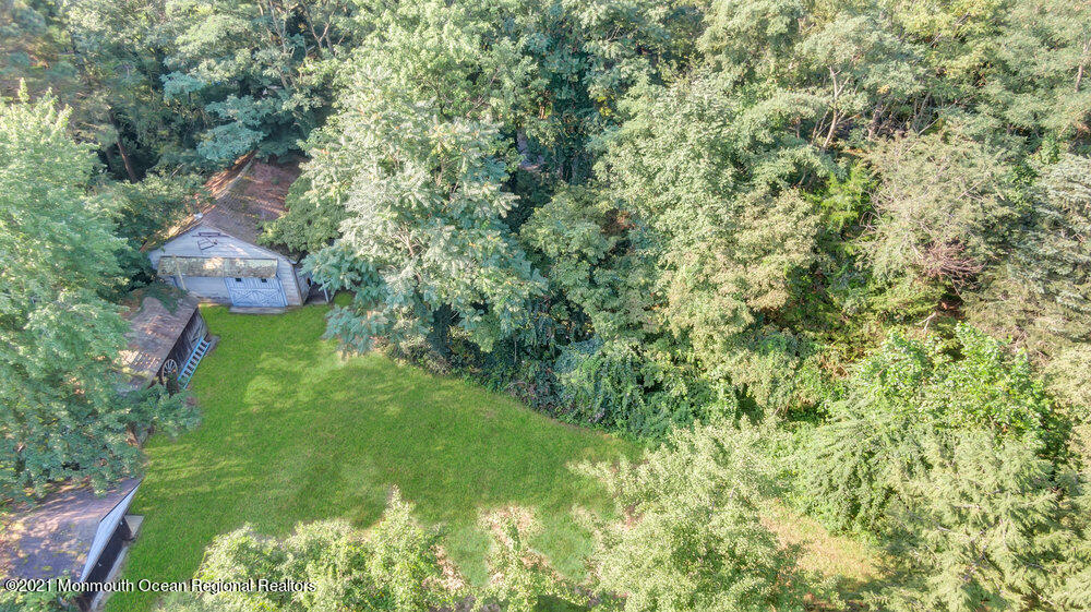 3234 Ridgewood Road Allenwood, NJ 08720 - Photo 46 of 49 a view of a garden from a house