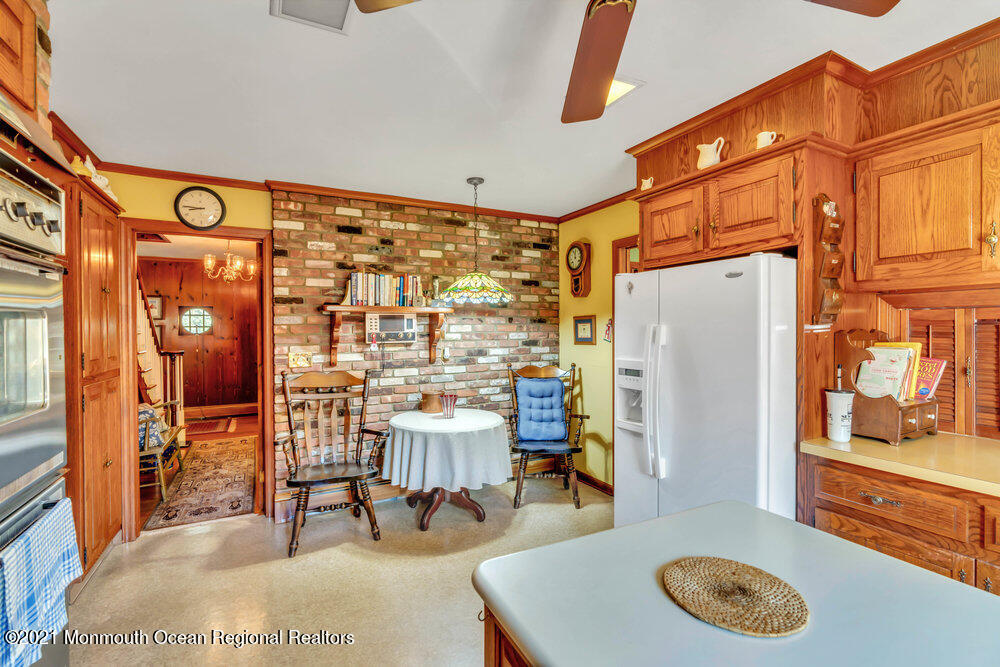 3234 Ridgewood Road Allenwood, NJ 08720 - Photo 9 of 49 a dining room with furniture and a floor to ceiling window