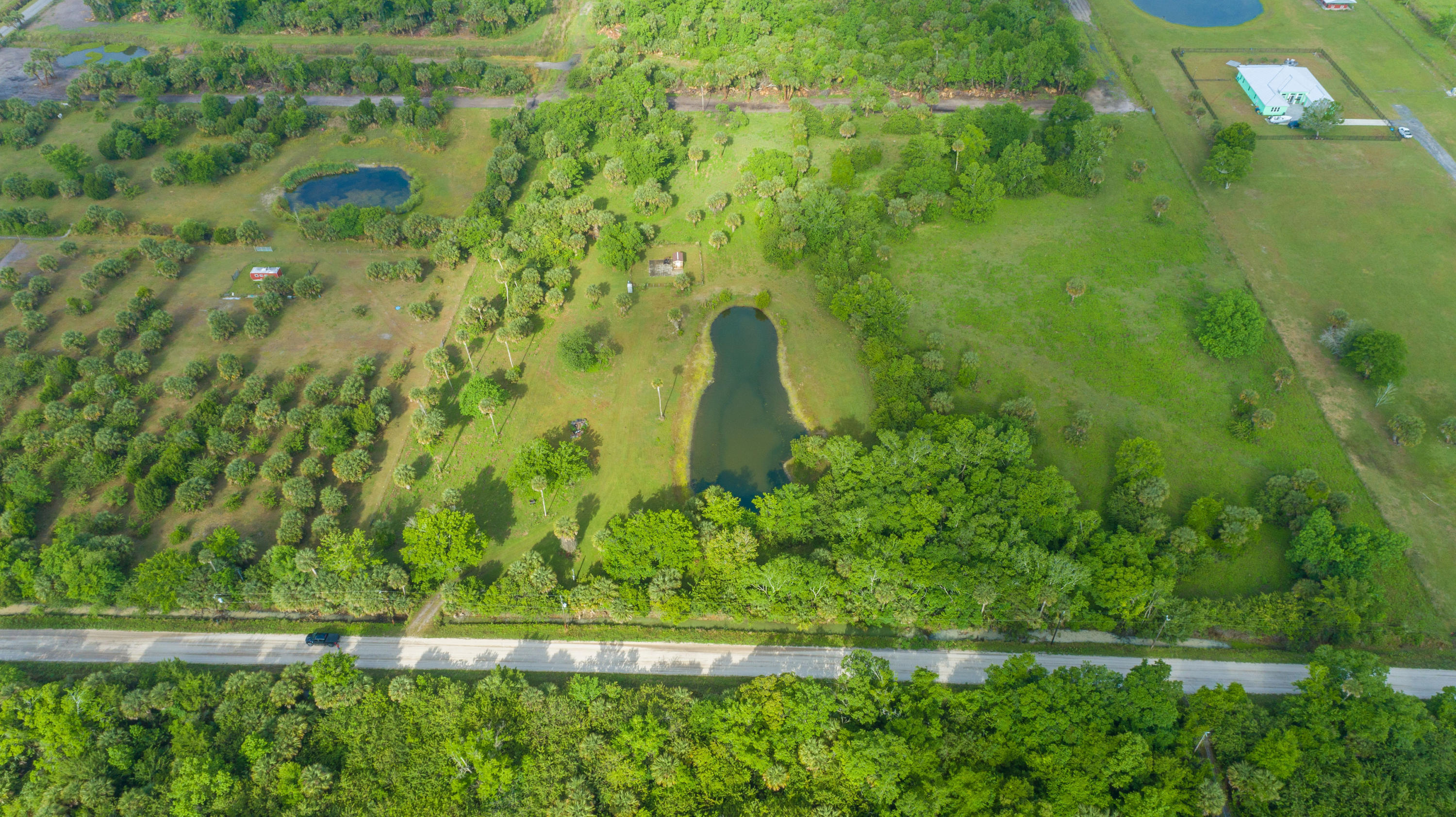 1560 County Line Road Oak Hill, FL 32759 - Photo 16 of 22 Aerial from East