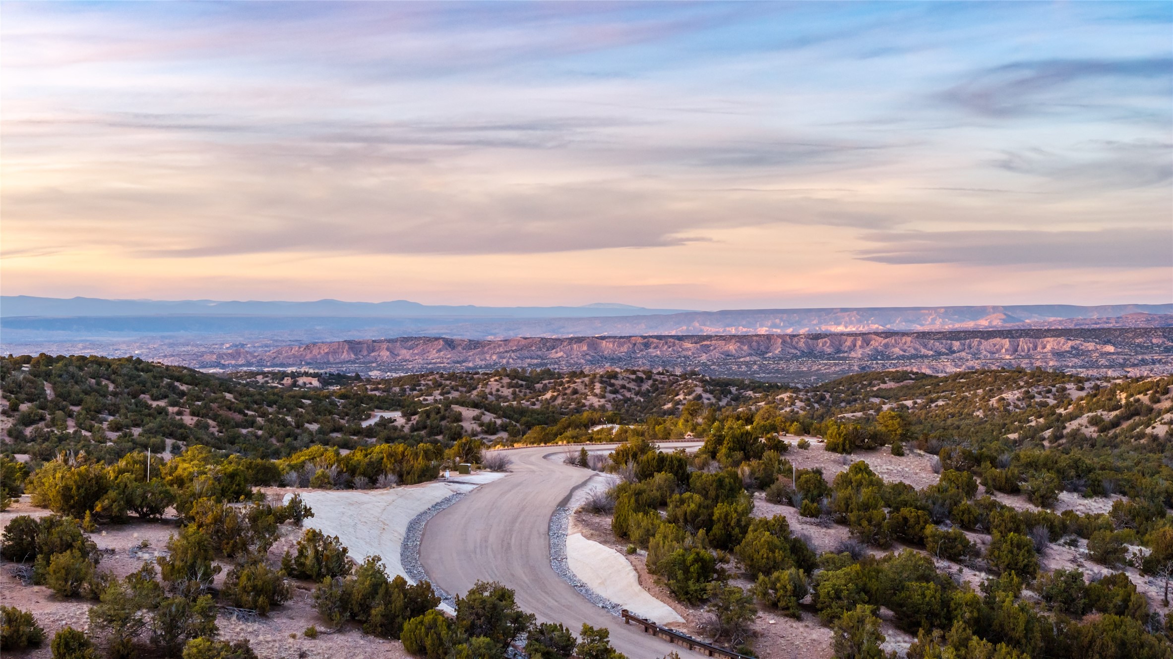 97 San Rafael Drive, Unit LOT 5 Santa Fe, NM 87506 - Photo 10 of 12 Your drive home through San Rafael Reserve.