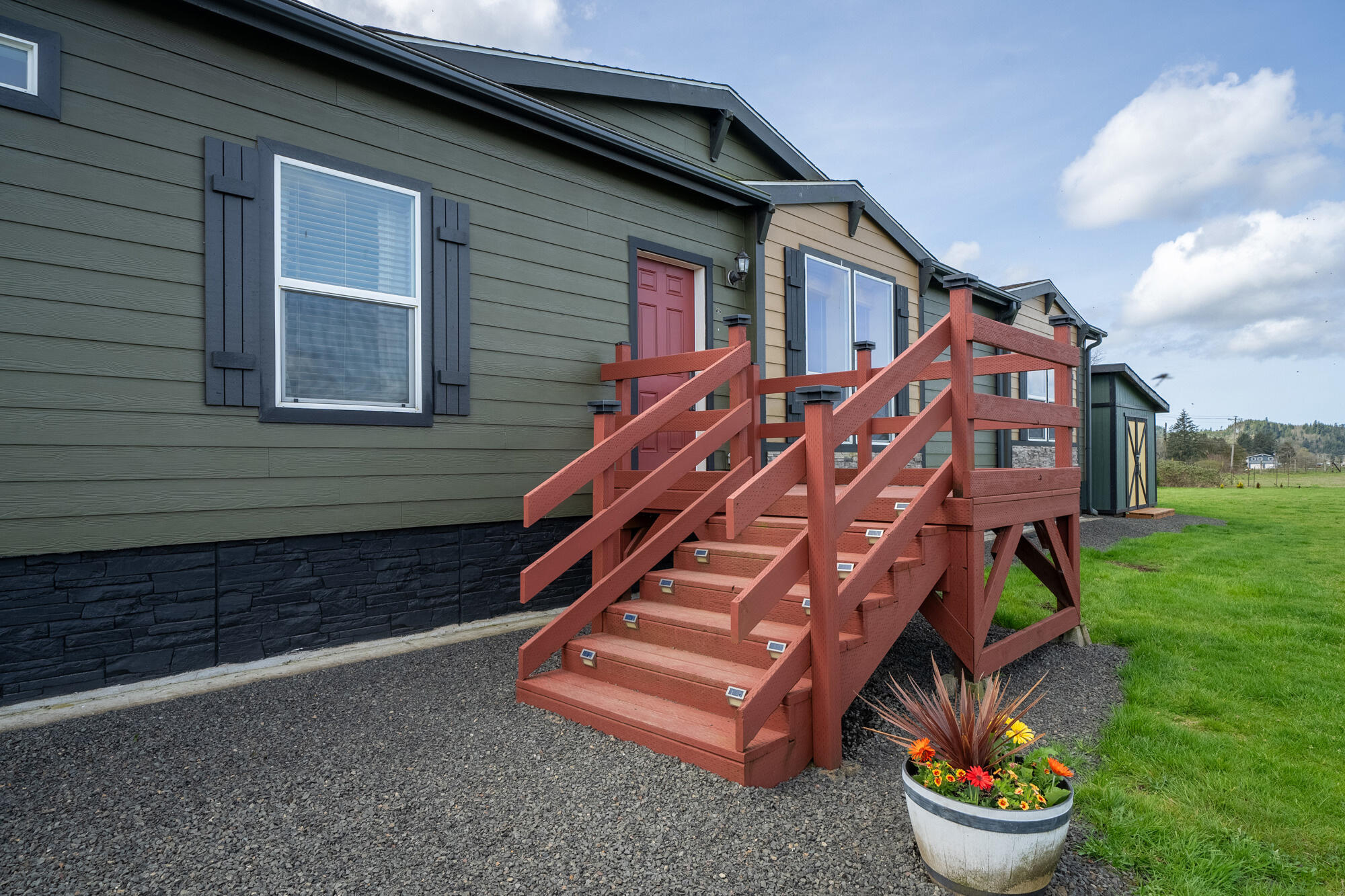 7400 South Prairie Road Tillamook, OR 97141 - Photo 40 of 62 a front view of a house with a yard