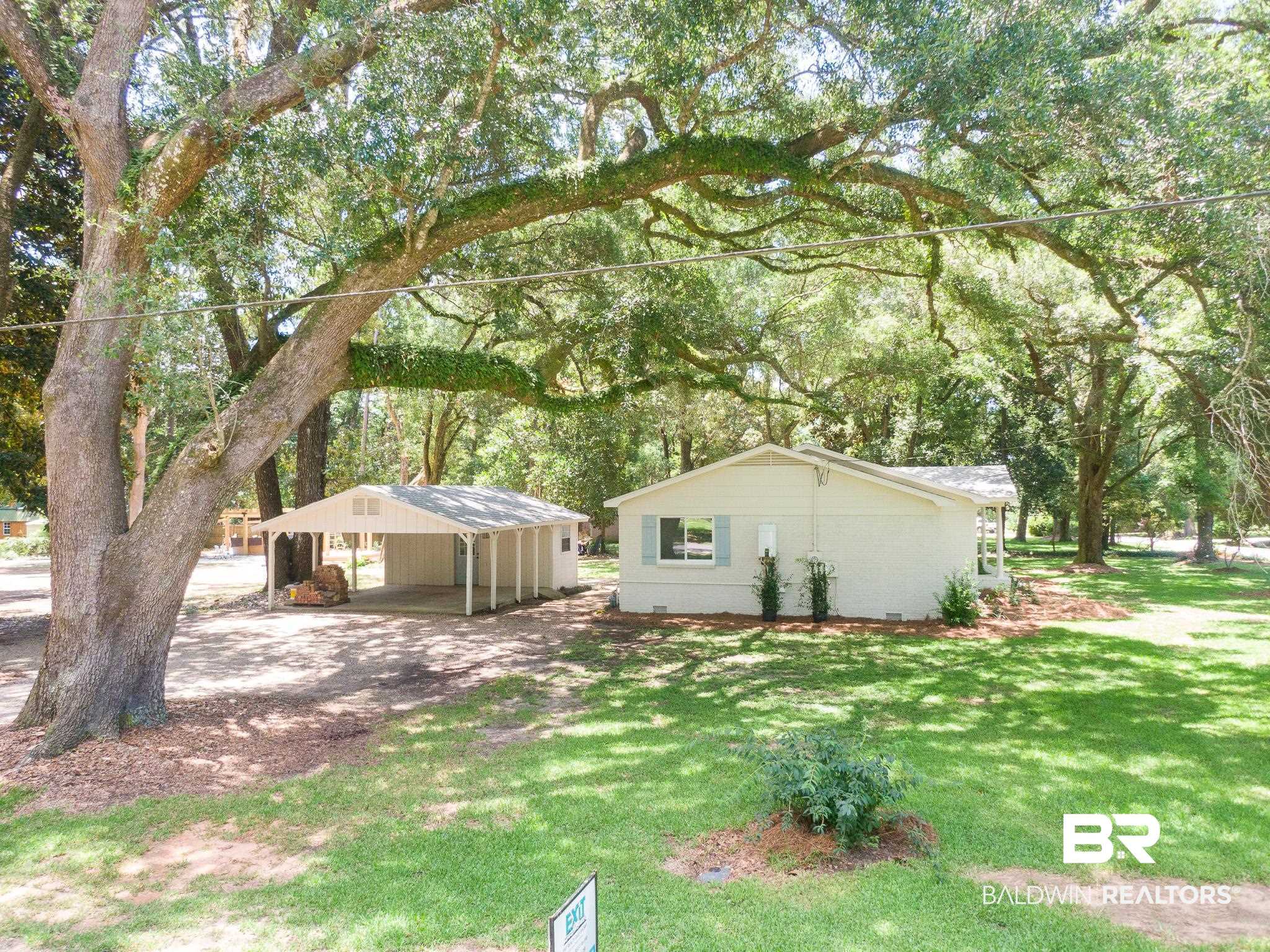 12190 Pecan Grove Street Magnolia Springs, AL 36555 - Photo 31 of 45 View of yard featuring an outdoor structure