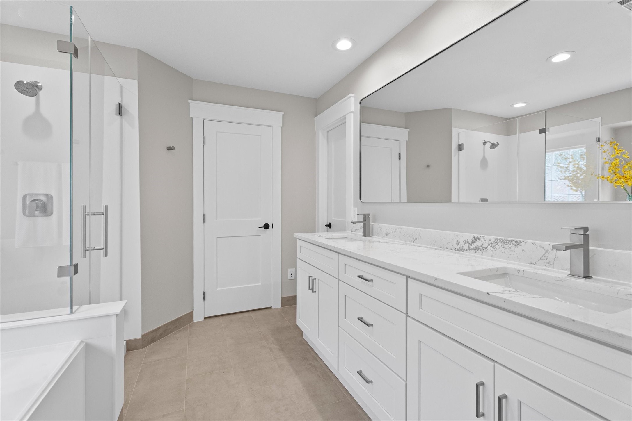 30111 Granum Drive Spring, TX 77386 - Photo 33 of 45 a bathroom with double sink and a mirror