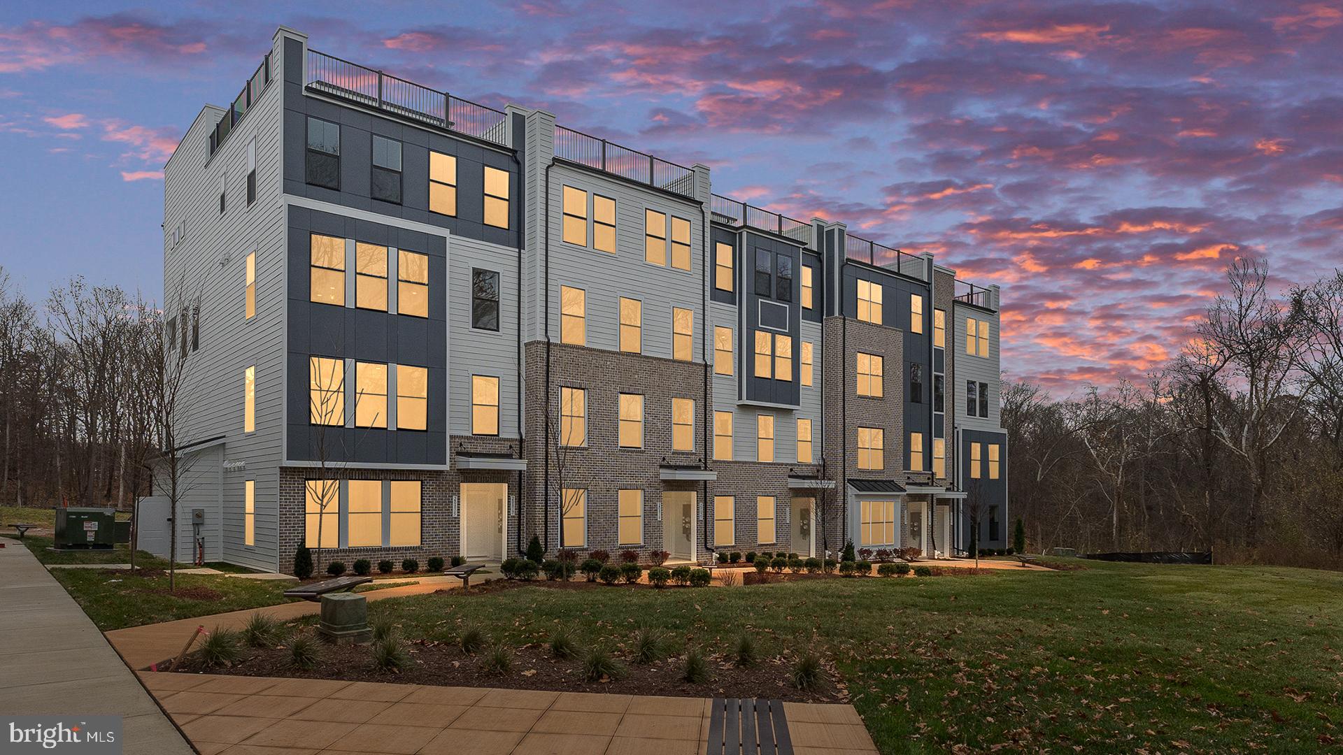 a front view of a building with garden
