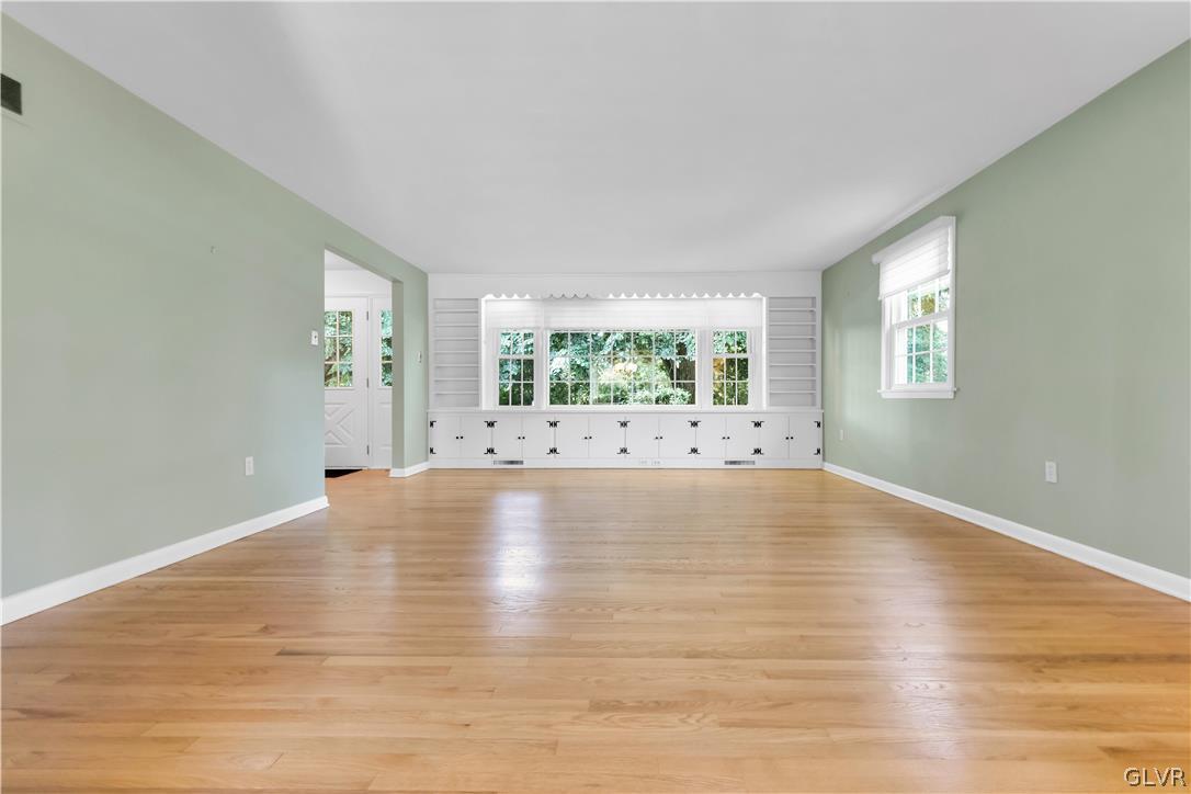 430 Macada Road Bethlehem, PA 18017 - Photo 13 of 45 Living Room w/crisp white built-ins & outdoor view