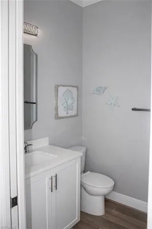 a kitchen with a stove top oven and cabinets