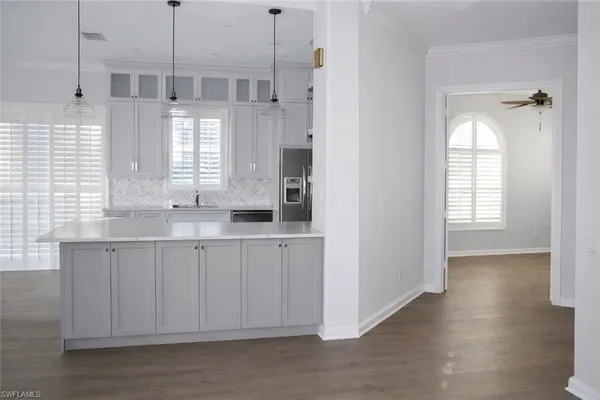 a bathroom with a double vanity sink and mirror