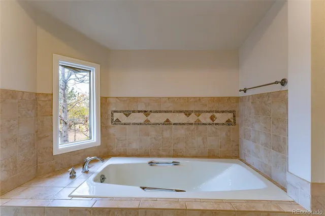 a bathroom with a bathtub