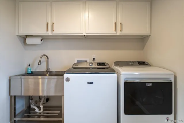 a kitchen with a stove and a sink