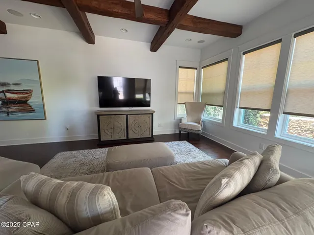 a bedroom with a bed and tv