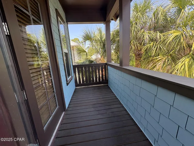 a spacious bathroom with a double vanity sink a mirror and a