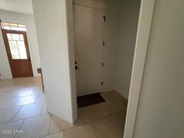 a view of a livingroom with furniture and windows