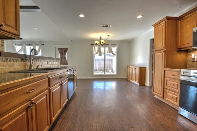 a room with a window and a sink