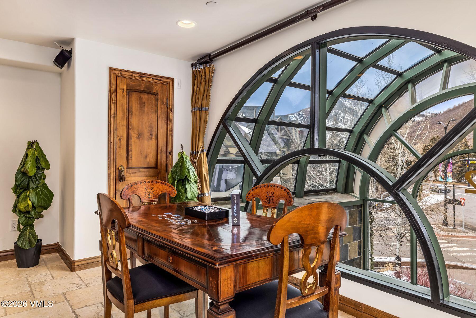 12 Vail Road, Unit R8 Vail, CO 81657 - Photo 14 of 41 a view of an chairs and table in the balcony