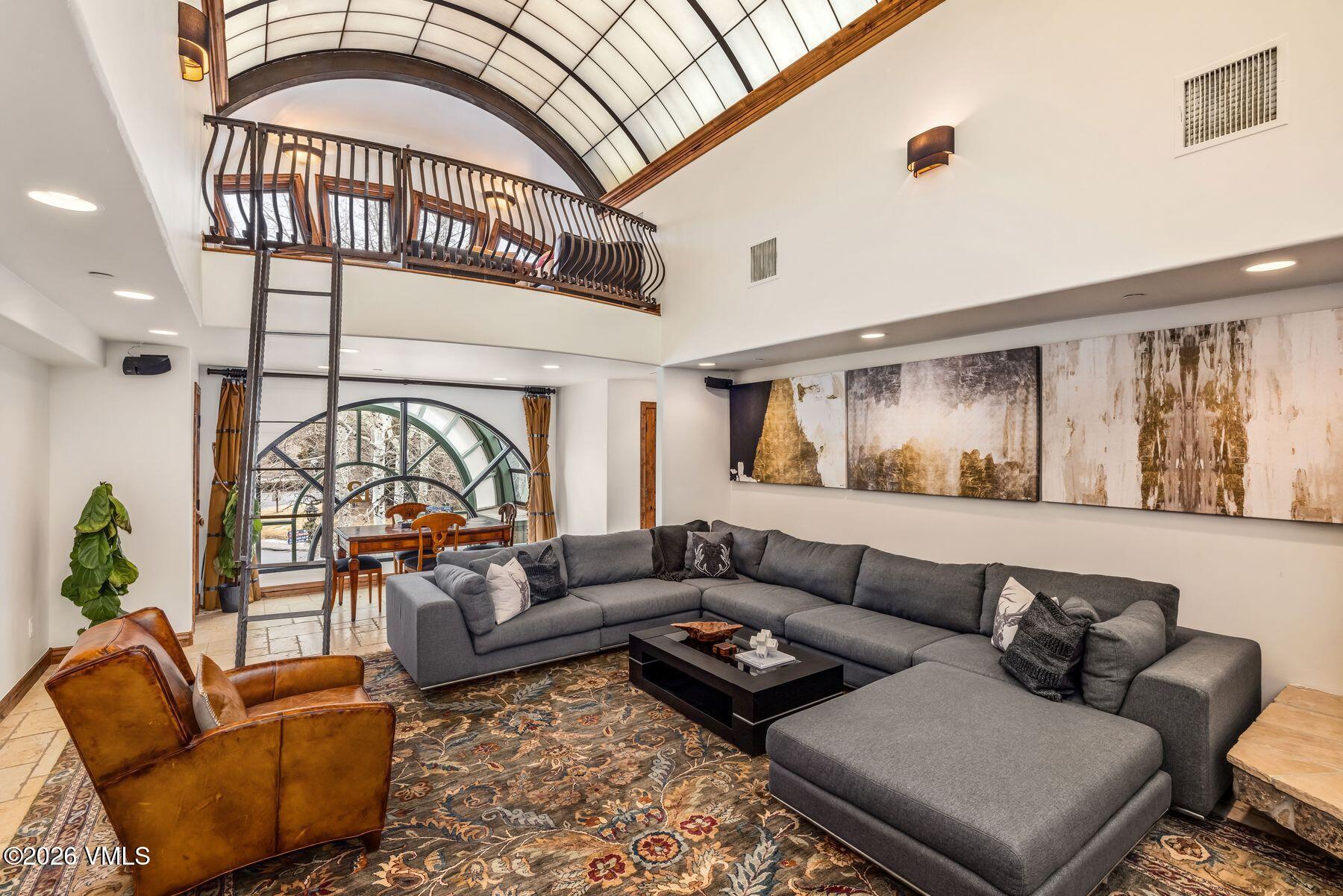 12 Vail Road, Unit R8 Vail, CO 81657 - Photo 15 of 41 a living room with furniture