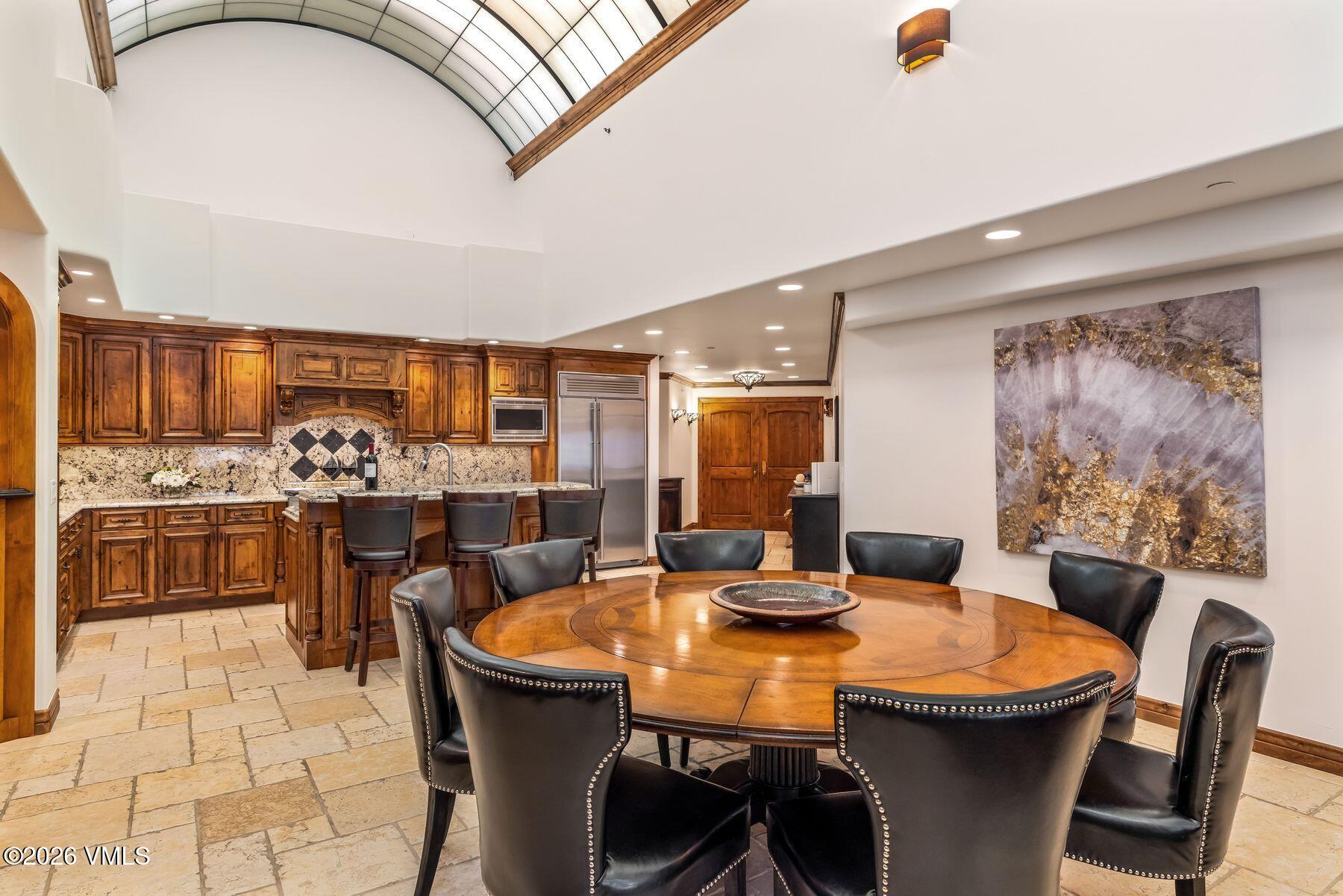 12 Vail Road, Unit R8 Vail, CO 81657 - Photo 18 of 41 a view of a dining room with furniture