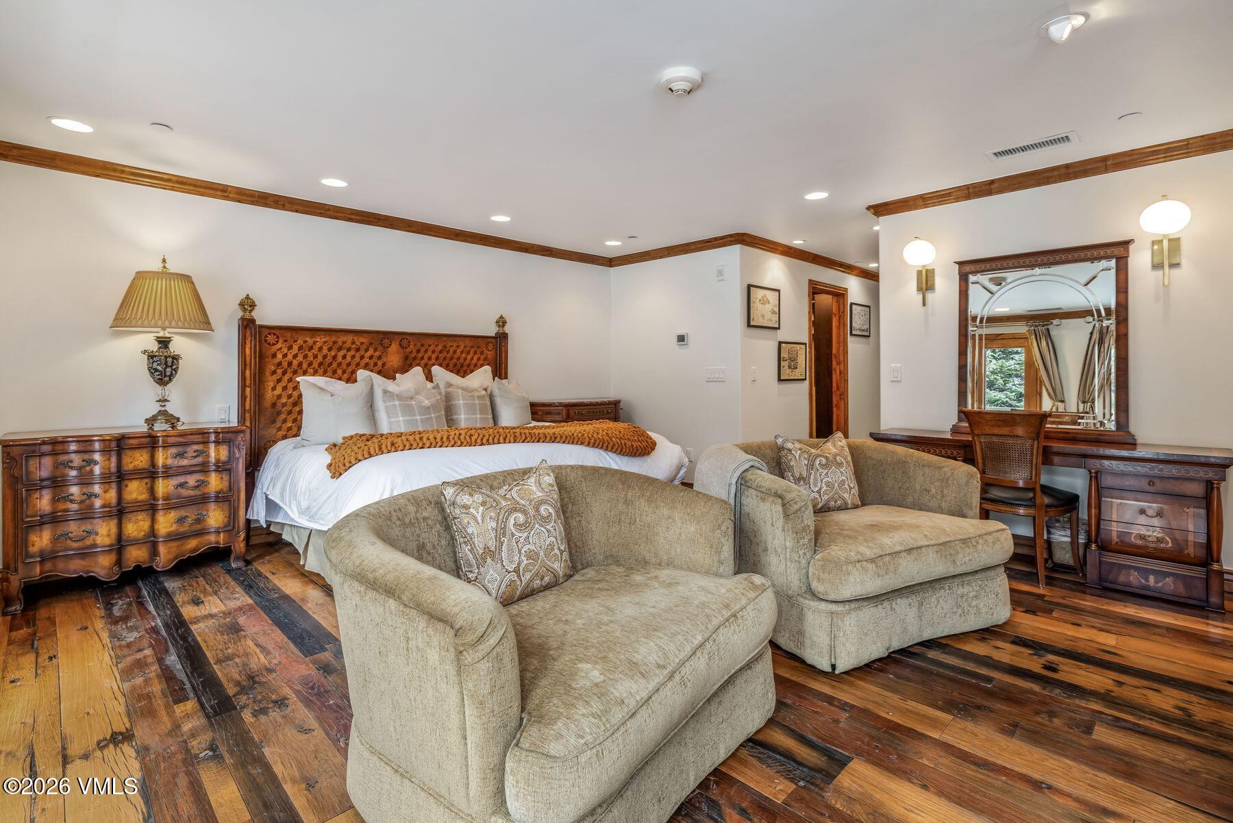 12 Vail Road, Unit R8 Vail, CO 81657 - Photo 25 of 41 a bedroom with furniture and a couch