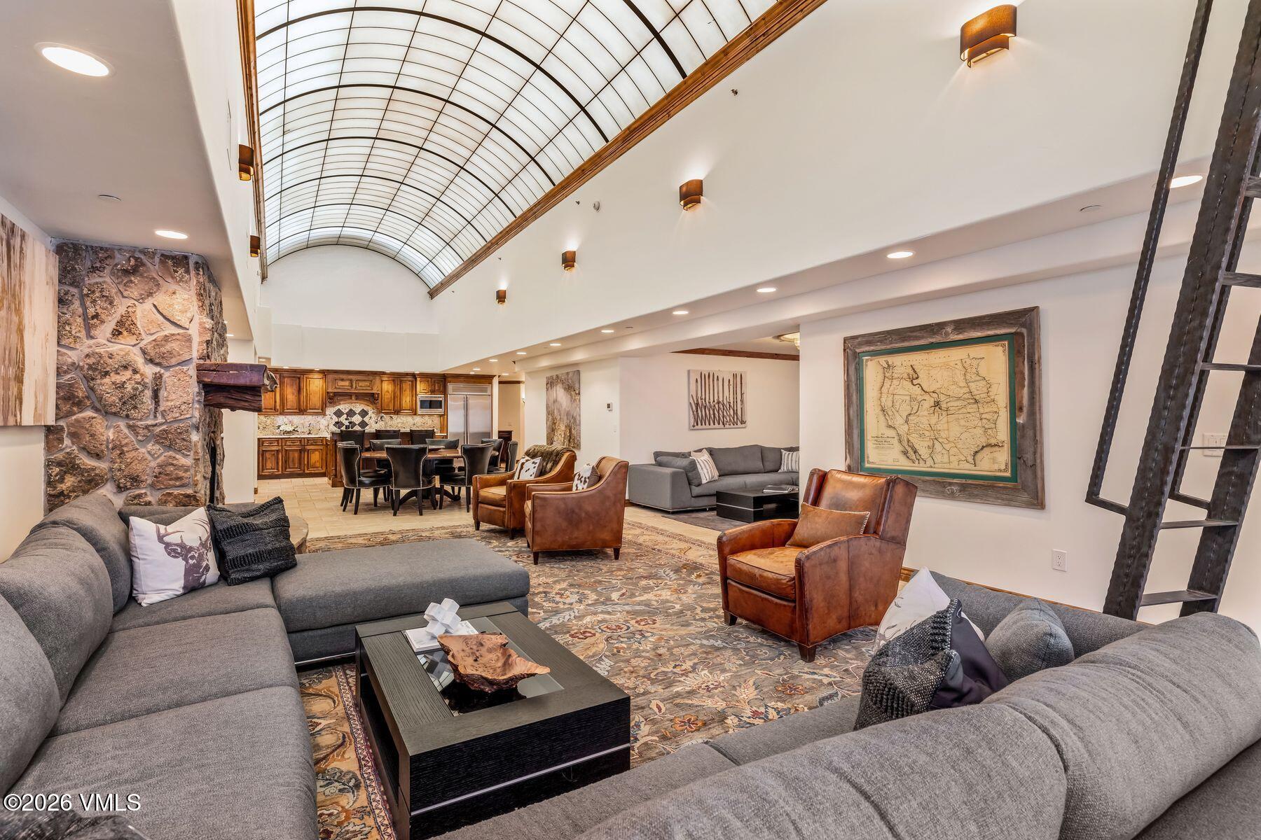 12 Vail Road, Unit R8 Vail, CO 81657 - Photo 4 of 41 a living room with furniture