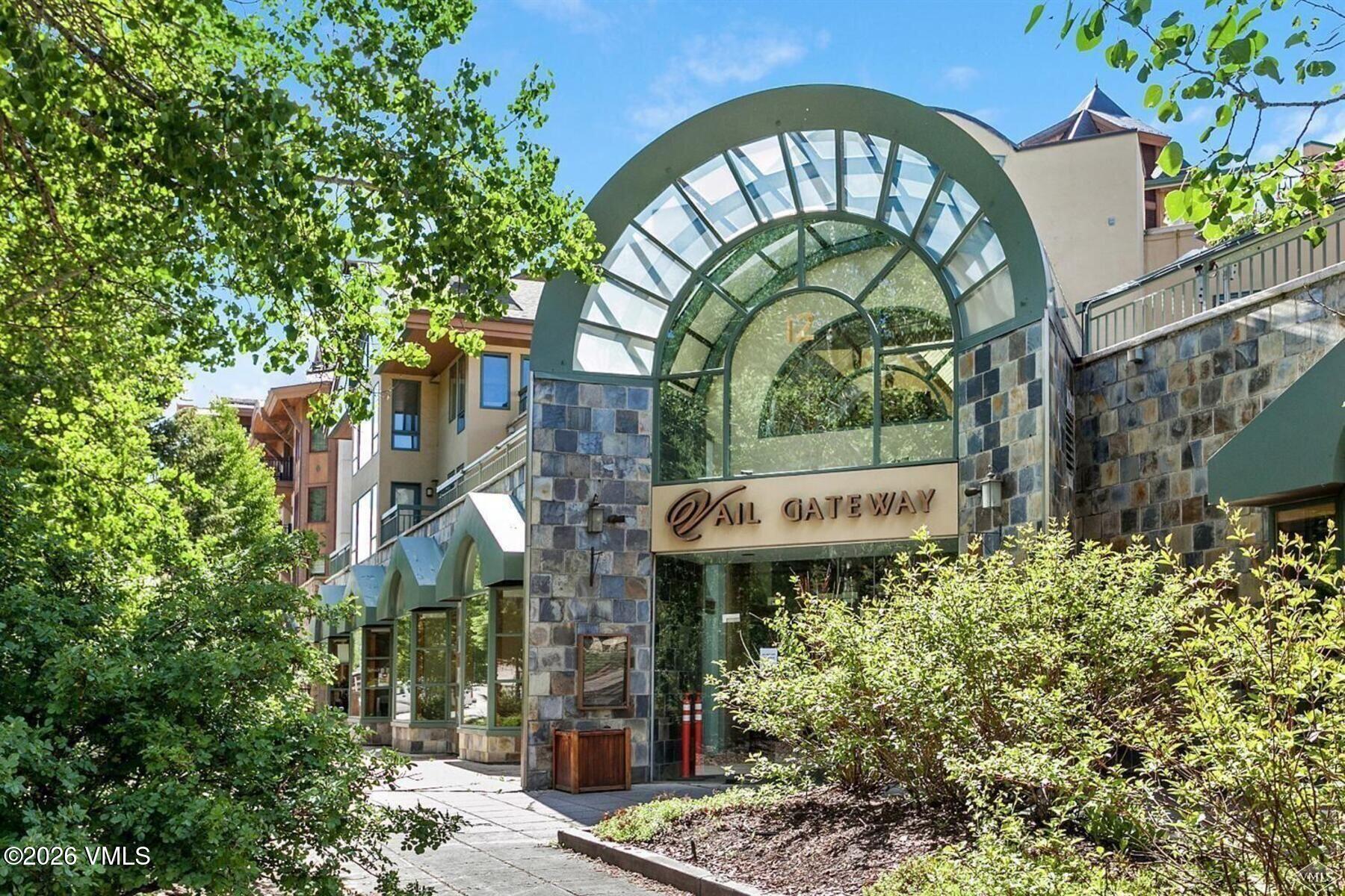 12 Vail Road, Unit R8 Vail, CO 81657 - Photo 7 of 41 a sign on the side of a building